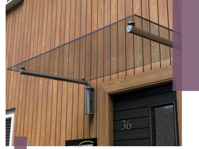 Стеклянные козырьки на входы и фасады в Губахе